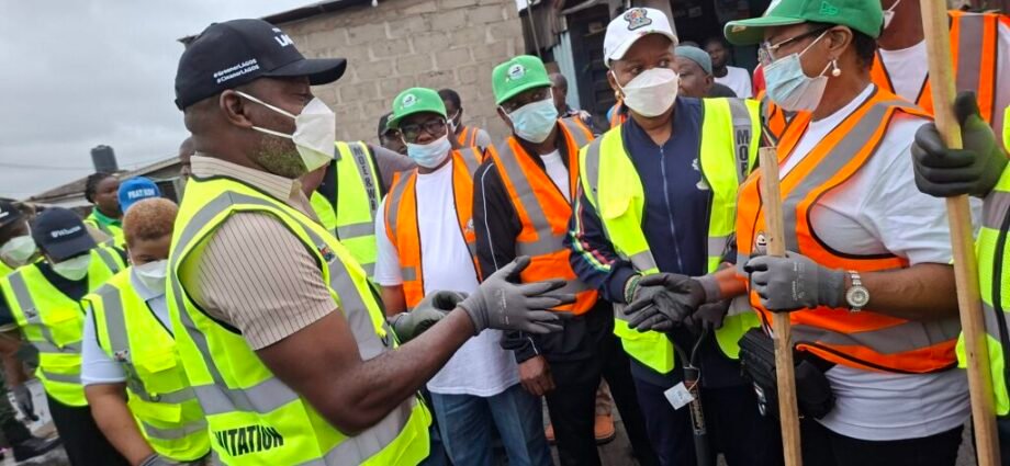 Permanent Secretary, Public Service Office, Mrs Sukanmi Oyegbola (black long sleeve) during the environmental sanitation on Saturday