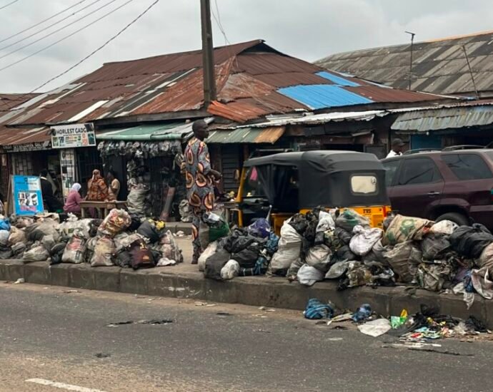 Refuse in front of Amukoko Cemetery Orile Road