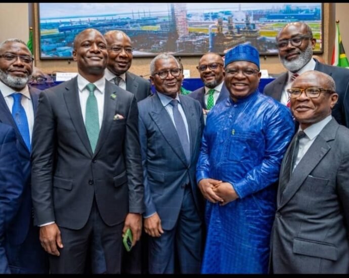 Aig-Imoukhuede, Dangote and others at the Opening Gong Ceremony and Fact Behind the Offer Presentation at the Nigerian Exchange (NGX)