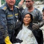 Nepal Police and Armed Police Force (APF) members rescued Chandika Kumari Shrestha, victim of the deadly flash floods and mudslides, in Betrawati, Nuwakot District, Nepal,