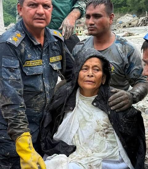 Nepal Police and Armed Police Force (APF) members rescued Chandika Kumari Shrestha, victim of the deadly flash floods and mudslides, in Betrawati, Nuwakot District, Nepal,