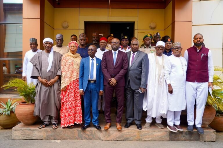 The Minister of Interior, Dr Olubunmi Tunji-Ojo with others at the inauguration of 10-member independent committee investigating the deaths of 37 suspected illegal miners on Tuesday in Abuja