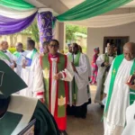 Middle: Most Rev. Henry Ndukuba, Anglican Primate, flanked by members of the clergy