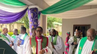 Middle: Most Rev. Henry Ndukuba, Anglican Primate, flanked by members of the clergy