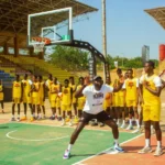 Olalekan Ajayi with youth at camp
