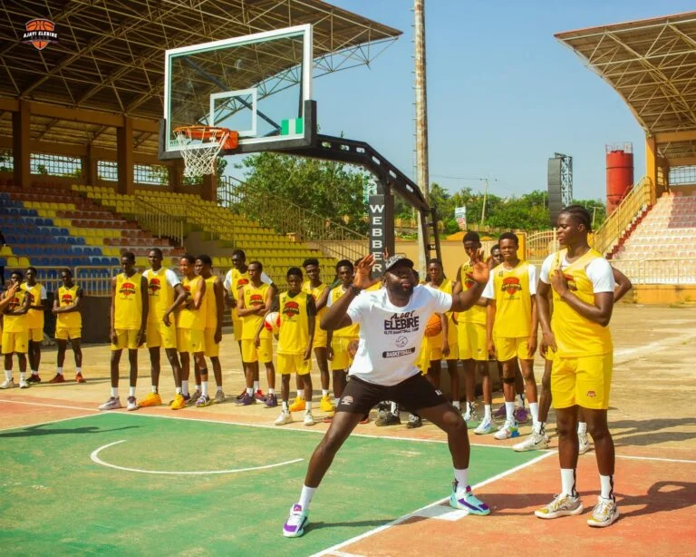Olalekan Ajayi with youth at camp