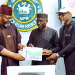 L-R: Executive Chairman/CEO of the Presidential Initiative on Compressed Natural Gas and Electric Vehicles (Pi-CNG & EV), Ismaeel Ahmed; Minister of State Petroleum Resources (Gas), Rt. Hon. Ekperikpe Ekpo; and Coordinator of the Decade of Gas Secretariat, Ed Ubong, during the presentation of progress reports on the CNG programme to the Minister by Pi-CNG & EV and the Decade of Gas Secretariat at the Ministry of Petroleum Resources, NNPC Towers, Abuja, on Friday.